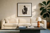 Neutral Nudes II Sq by Anne Tavoletti. Displayed in a glass frame with matte in a clean modern living room. Available as an archival giclee rolled canvas, fine art paper, or poster print. SKU 80608a.