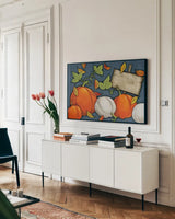 Pumpkin Patch by Anne Tavoletti. shown as a framed stretched canvas in a living room above a console. Available as a archival giclee rolled canvas, fine art paper, or poster print. SKU 26710i.
