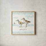 Sandpiper Sea IV by Anne Tavoletti. Shown in a natural wood glass frame for a timeless modern aesthetic. Available as an archival giclee rolled canvas, fine art paper, or poster print. SKU 21884a.
