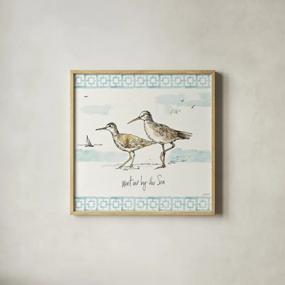 Sandpiper Sea IV by Anne Tavoletti. Shown in a natural wood glass frame for a timeless modern aesthetic. Available as an archival giclee rolled canvas, fine art paper, or poster print. SKU 21884a.