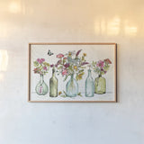 Simply Petals I by Anne Tavoletti. shown as a paper print in a natural frame. Available as a archival giclee rolled canvas, fine art paper, or poster print. SKU 38885i.