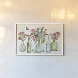 Simply Petals I by Anne Tavoletti. shown as a paper print in a white frame. Available as a archival giclee rolled canvas, fine art paper, or poster print. SKU 38885i.