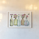 Simply Petals IV by Anne Tavoletti. shown as a paper print in a white frame. Available as a archival giclee rolled canvas, fine art paper, or poster print. SKU 38888i.