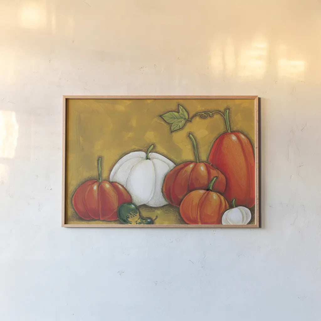 Six Pumpkins by Anne Tavoletti. shown as a paper print in a natural frame. Available as a archival giclee rolled canvas, fine art paper, or poster print. SKU 26712i.