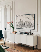 Skyline Sketches III by Anne Tavoletti. shown as a framed stretched canvas in a living room above a console. Available as a archival giclee rolled canvas, fine art paper, or poster print. SKU 58817i.