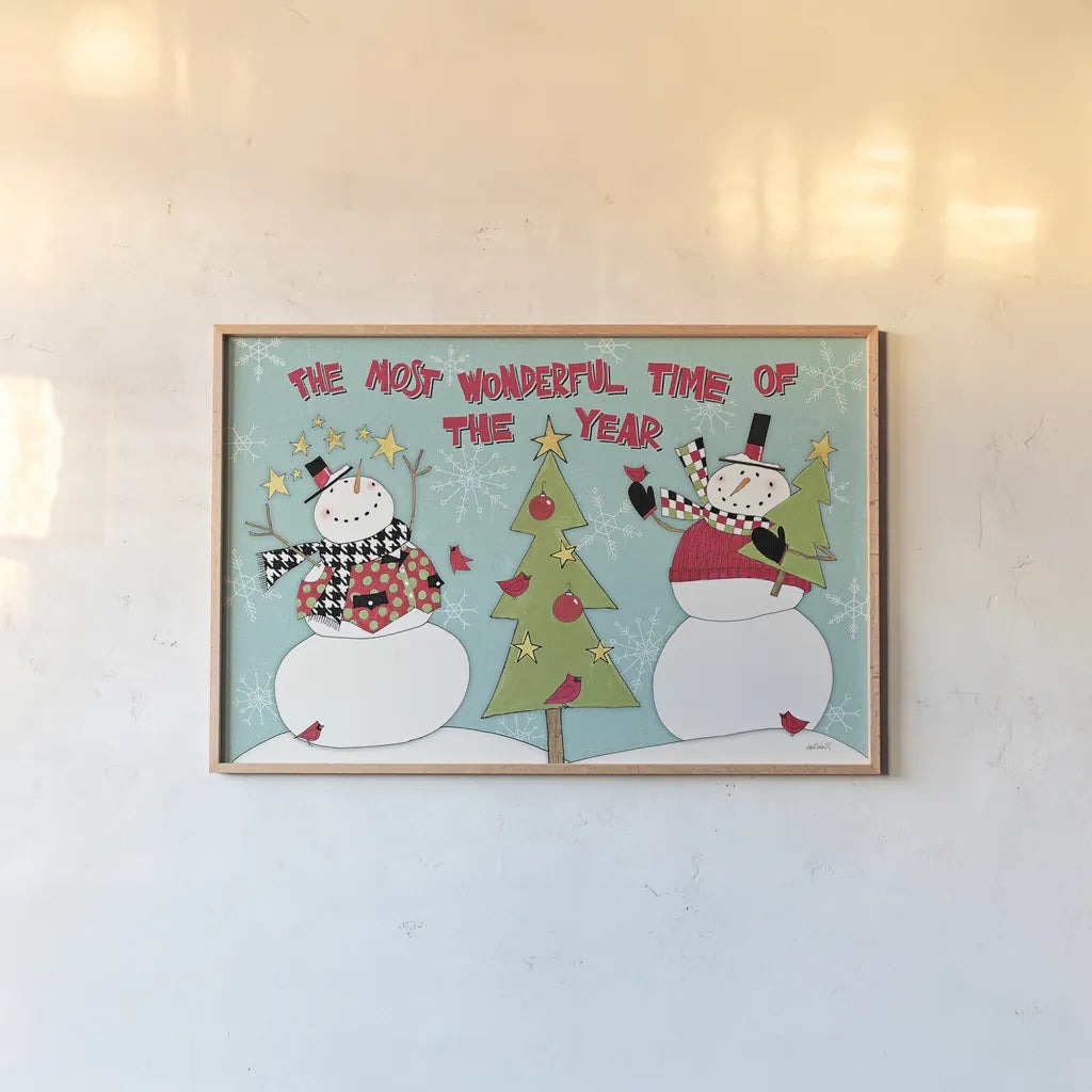 Snowman Sentiments I by Anne Tavoletti. shown as a paper print in a natural frame. Available as a archival giclee rolled canvas, fine art paper, or poster print. SKU 31819i.