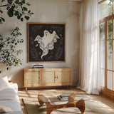 Spooky Silhouettes III by Anne Tavoletti. Shown in a natural wood frame in a cozy modern living room. Available as an archival giclee rolled canvas, fine art paper, or poster print. SKU 96492a.