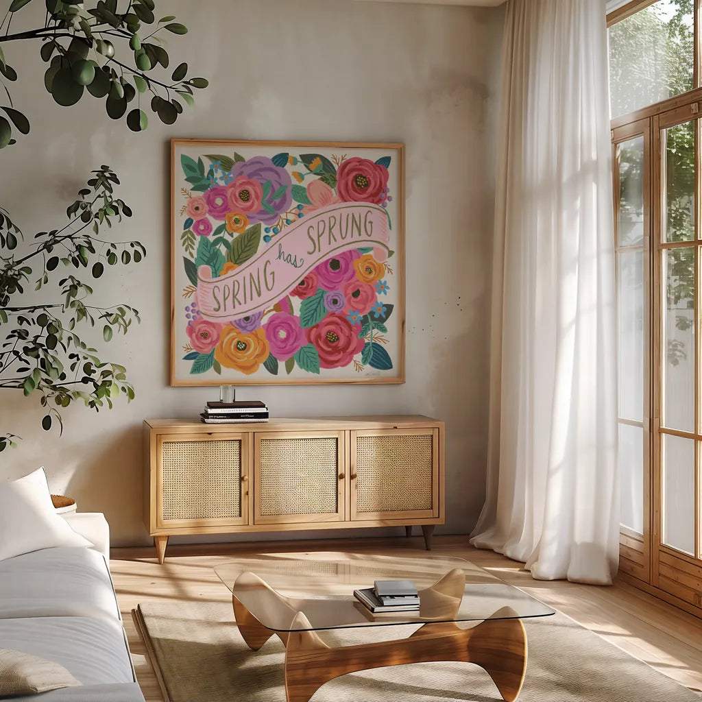 Spring Has Sprung I by Anne Tavoletti. Shown in a natural wood frame in a cozy modern living room. Available as an archival giclee rolled canvas, fine art paper, or poster print. SKU 63171a.