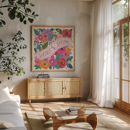 Spring Has Sprung I by Anne Tavoletti. Shown in a natural wood frame in a cozy modern living room. Available as an archival giclee rolled canvas, fine art paper, or poster print. SKU 63171a.