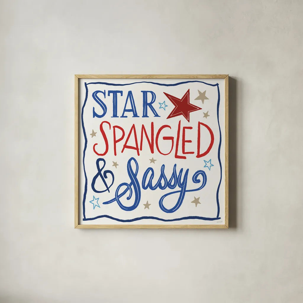 Star Spangled Sayings I by Anne Tavoletti. Shown in a natural wood glass frame for a timeless modern aesthetic. Available as an archival giclee rolled canvas, fine art paper, or poster print. SKU 85904a.