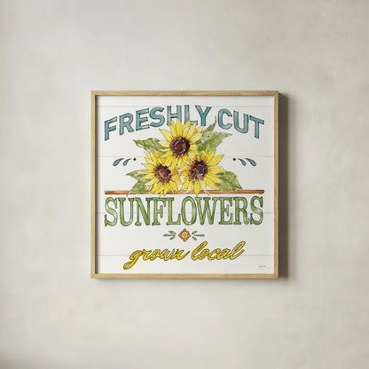 Sunflower Fields III by Anne Tavoletti. Shown in a natural wood glass frame for a timeless modern aesthetic. Available as an archival giclee rolled canvas, fine art paper, or poster print. SKU 54383a.