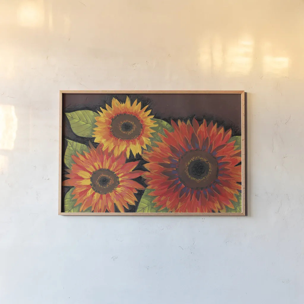 Sunflowers by Anne Tavoletti. shown as a paper print in a natural frame. Available as a archival giclee rolled canvas, fine art paper, or poster print. SKU 26713i.