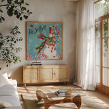 Sweet Snowmen II Blue by Anne Tavoletti. Shown in a natural wood frame in a cozy modern living room. Available as an archival giclee rolled canvas, fine art paper, or poster print. SKU 20571a.