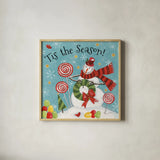 Sweet Snowmen III Blue by Anne Tavoletti. Shown in a natural wood glass frame for a timeless modern aesthetic. Available as an archival giclee rolled canvas, fine art paper, or poster print. SKU 20572a.