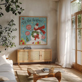Sweet Snowmen III Blue by Anne Tavoletti. Shown in a natural wood frame in a cozy modern living room. Available as an archival giclee rolled canvas, fine art paper, or poster print. SKU 20572a.