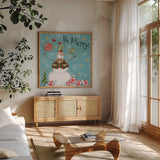 Sweet Snowmen IV Blue by Anne Tavoletti. Shown in a natural wood frame in a cozy modern living room. Available as an archival giclee rolled canvas, fine art paper, or poster print. SKU 20573a.