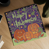 Three Halloween Pumpkins I by Anne Tavoletti. Shown as a detailed flat fine art print, highlighting archival giclee quality. Available as an archival giclee rolled canvas, fine art paper, or poster print. SKU 73733a.