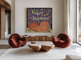 Three Halloween Pumpkins I by Anne Tavoletti. Shown as extra-large giant wall art in a modern living room. Available as an archival giclee rolled canvas, fine art paper, or poster print. SKU 73733a.
