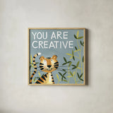 You Are Creative by Anne Tavoletti. Shown in a natural wood glass frame for a timeless modern aesthetic. Available as an archival giclee rolled canvas, fine art paper, or poster print. SKU 18512a.