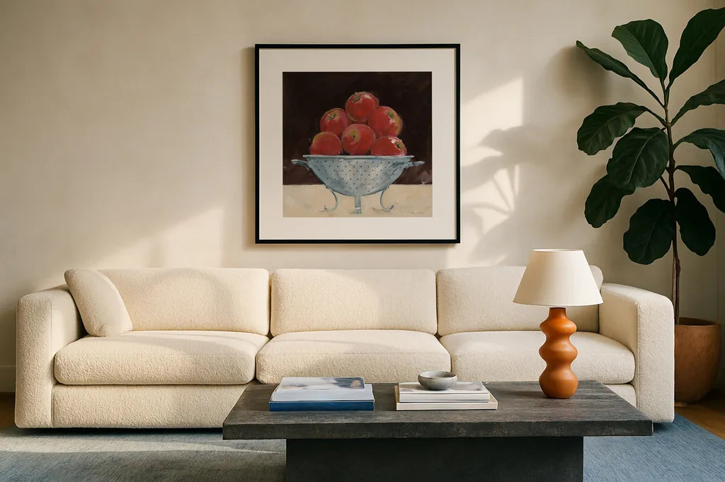Apples on Brown by Avery Tillmon. Displayed in a glass frame with matte in a clean modern living room. Available as an archival giclee rolled canvas, fine art paper, or poster print. SKU 76148a.