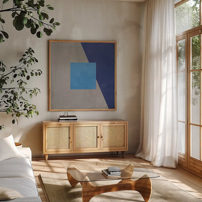 Azure Blue Silk Abstract II by Avery Tillmon. Shown in a natural wood frame in a cozy modern living room. Available as an archival giclee rolled canvas, fine art paper, or poster print. SKU 79768a.