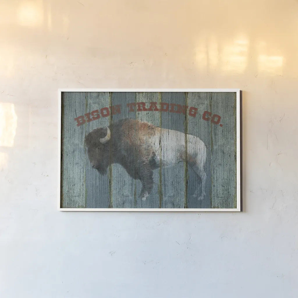 Bison Trading Co by Avery Tillmon. shown as a paper print in a white frame. Available as a archival giclee rolled canvas, fine art paper, or poster print. SKU 57492i.
