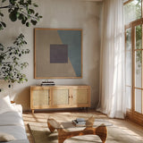 Blue Silk Abstract II by Avery Tillmon. Shown in a natural wood frame in a cozy modern living room. Available as an archival giclee rolled canvas, fine art paper, or poster print. SKU 68411a.