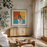 Camila by Avery Tillmon. Shown in a natural wood frame in a cozy modern living room. Available as an archival giclee rolled canvas, fine art paper, or poster print. SKU 46772a.