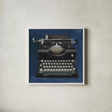 Classic Typewriter Navy by Avery Tillmon. Shown in a crisp white glass frame for a clean and minimalist style. Available as an archival giclee rolled canvas, fine art paper, or poster print. SKU 96709a.