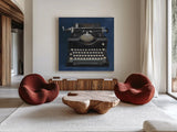 Classic Typewriter Navy by Avery Tillmon. Shown as extra-large giant wall art in a modern living room. Available as an archival giclee rolled canvas, fine art paper, or poster print. SKU 96709a.