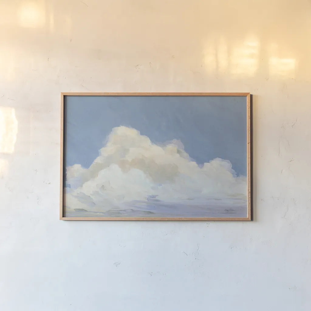 Clouds Over Low Tide by Avery Tillmon. shown as a paper print in a natural frame. Available as a archival giclee rolled canvas, fine art paper, or poster print. SKU 59071i.