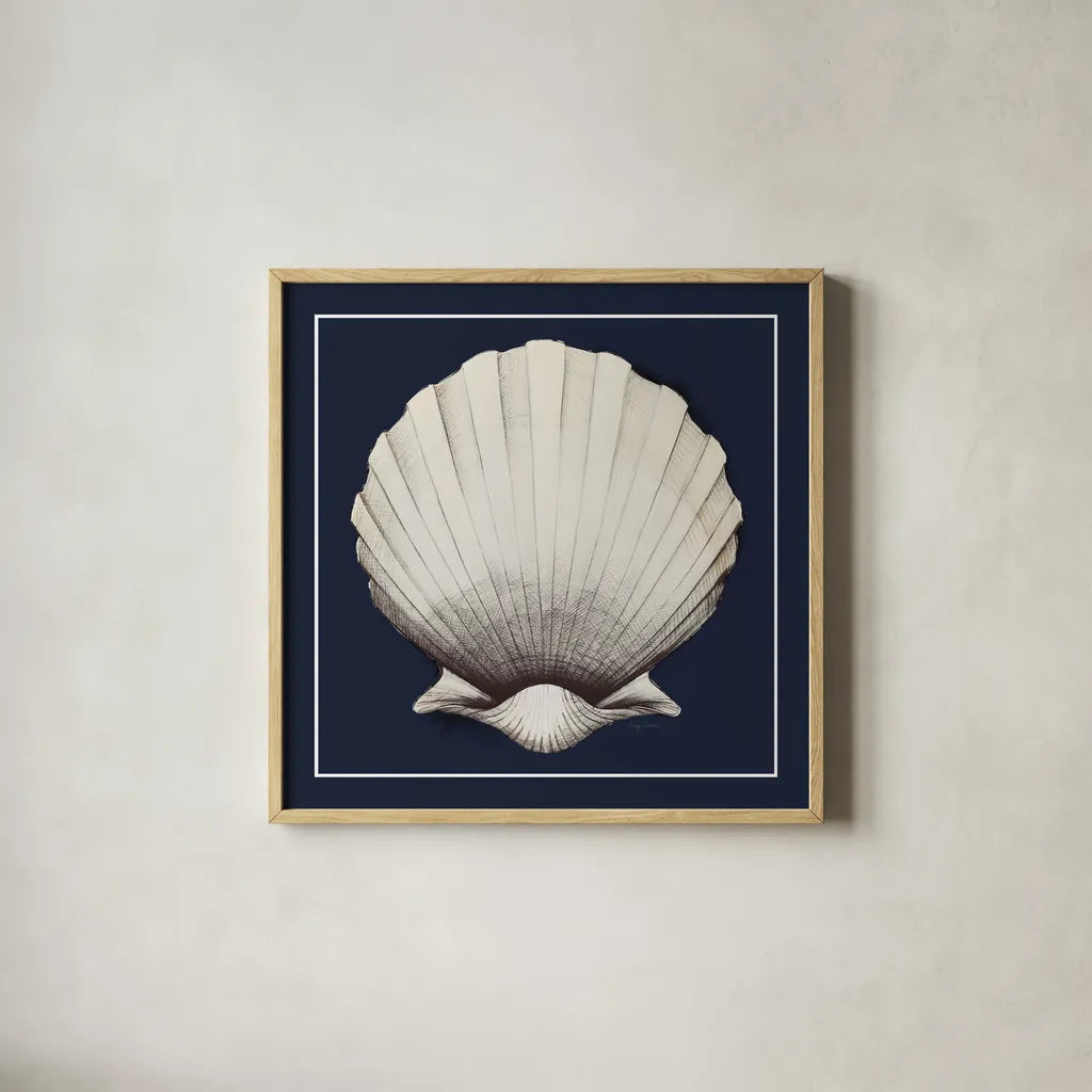 Coastal Shell II with Border Navy by Avery Tillmon. Shown in a natural wood glass frame for a timeless modern aesthetic. Available as an archival giclee rolled canvas, fine art paper, or poster print. SKU 56157a.