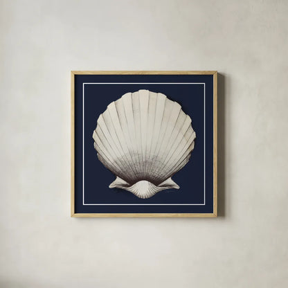 Coastal Shell II with Border Navy by Avery Tillmon. Shown in a natural wood glass frame for a timeless modern aesthetic. Available as an archival giclee rolled canvas, fine art paper, or poster print. SKU 56157a.