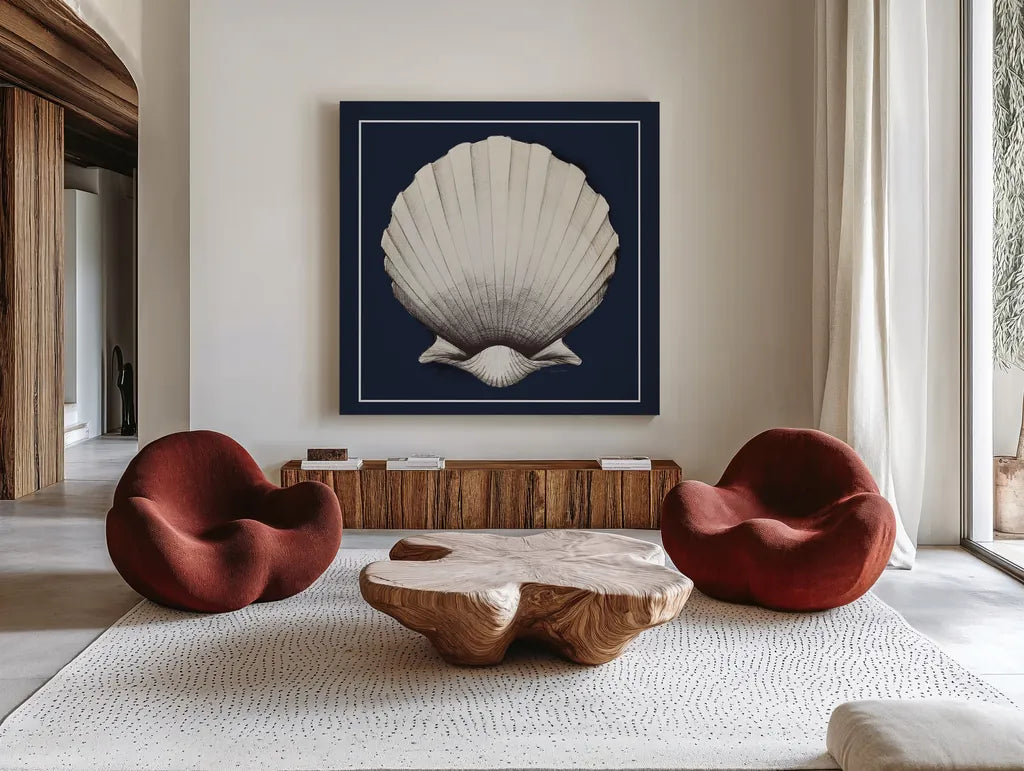 Coastal Shell II with Border Navy by Avery Tillmon. Shown as extra-large giant wall art in a modern living room. Available as an archival giclee rolled canvas, fine art paper, or poster print. SKU 56157a.