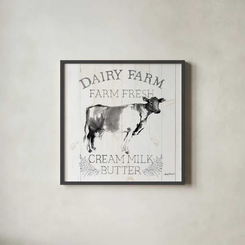 Dairy Farm Wood Black Cow Sq by Avery Tillmon. Shown in a sleek black glass frame for a contemporary gallery look. Available as an archival giclee rolled canvas, fine art paper, or poster print. SKU 81173a.