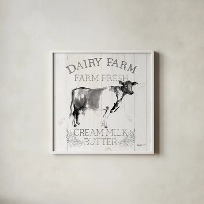 Dairy Farm Wood Black Cow Sq by Avery Tillmon. Shown in a crisp white glass frame for a clean and minimalist style. Available as an archival giclee rolled canvas, fine art paper, or poster print. SKU 81173a.