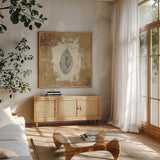 Gilded Leaf III by Avery Tillmon. Shown in a natural wood frame in a cozy modern living room. Available as an archival giclee rolled canvas, fine art paper, or poster print. SKU 17831a.