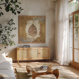 Gilded Leaf VI by Avery Tillmon. Shown in a natural wood frame in a cozy modern living room. Available as an archival giclee rolled canvas, fine art paper, or poster print. SKU 17833a.