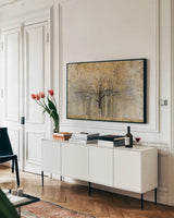 Open Arms Gold by Avery Tillmon. shown as a framed stretched canvas in a living room above a console. Available as a archival giclee rolled canvas, fine art paper, or poster print. SKU 28277i.