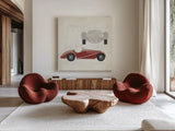 Roadster I Red Car by Avery Tillmon. Shown as extra-large giant wall art in a modern living room. Available as an archival giclee rolled canvas, fine art paper, or poster print. SKU 53125a.
