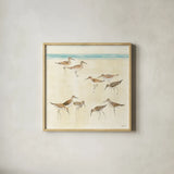 Sandpipers by Avery Tillmon. Shown in a natural wood glass frame for a timeless modern aesthetic. Available as an archival giclee rolled canvas, fine art paper, or poster print. SKU 11219a.