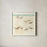 Sandpipers by Avery Tillmon. Shown in a crisp white glass frame for a clean and minimalist style. Available as an archival giclee rolled canvas, fine art paper, or poster print. SKU 11219a.