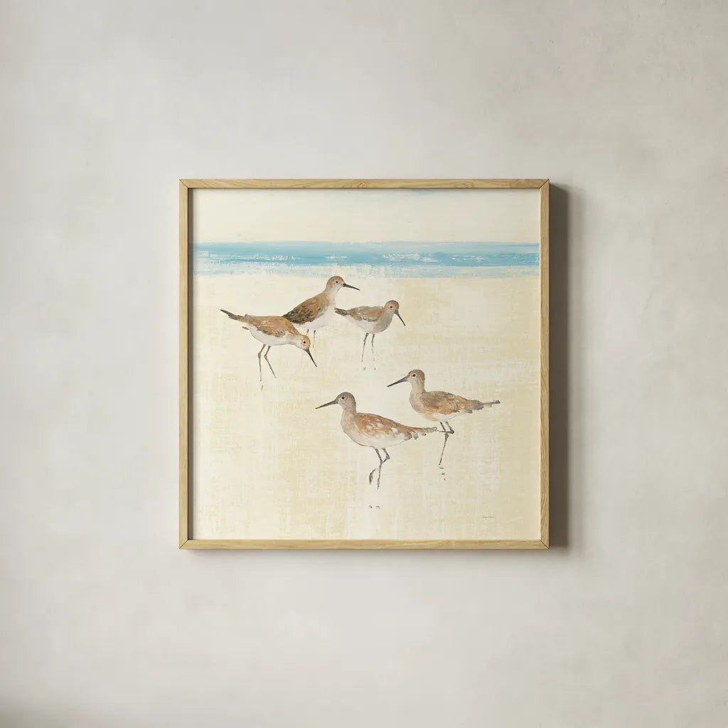 Sandpipers Square I Blue by Avery Tillmon. Shown in a natural wood glass frame for a timeless modern aesthetic. Available as an archival giclee rolled canvas, fine art paper, or poster print. SKU 34371a.