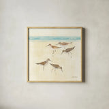 Sandpipers Square II by Avery Tillmon. Shown in a natural wood glass frame for a timeless modern aesthetic. Available as an archival giclee rolled canvas, fine art paper, or poster print. SKU 11833a.