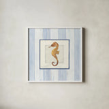 Sanibel Shell IV by Avery Tillmon. Shown in a crisp white glass frame for a clean and minimalist style. Available as an archival giclee rolled canvas, fine art paper, or poster print. SKU 8915a.