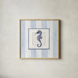 Sanibel Shell IV Navy by Avery Tillmon. Shown in a natural wood glass frame for a timeless modern aesthetic. Available as an archival giclee rolled canvas, fine art paper, or poster print. SKU 65635a.