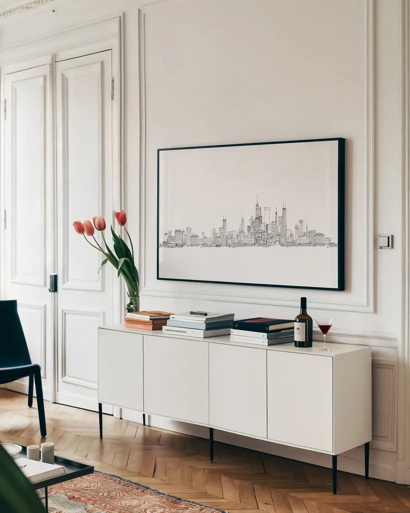 Skyline Chicago v2 by Avery Tillmon. shown as a framed stretched canvas in a living room above a console. Available as a archival giclee rolled canvas, fine art paper, or poster print. SKU 83559i.