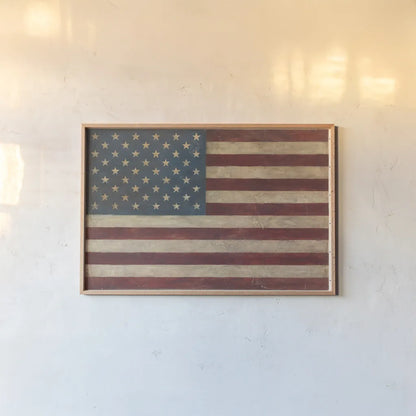 US Flag by Avery Tillmon. shown as a paper print in a natural frame. Available as a archival giclee rolled canvas, fine art paper, or poster print. SKU 15679i.
