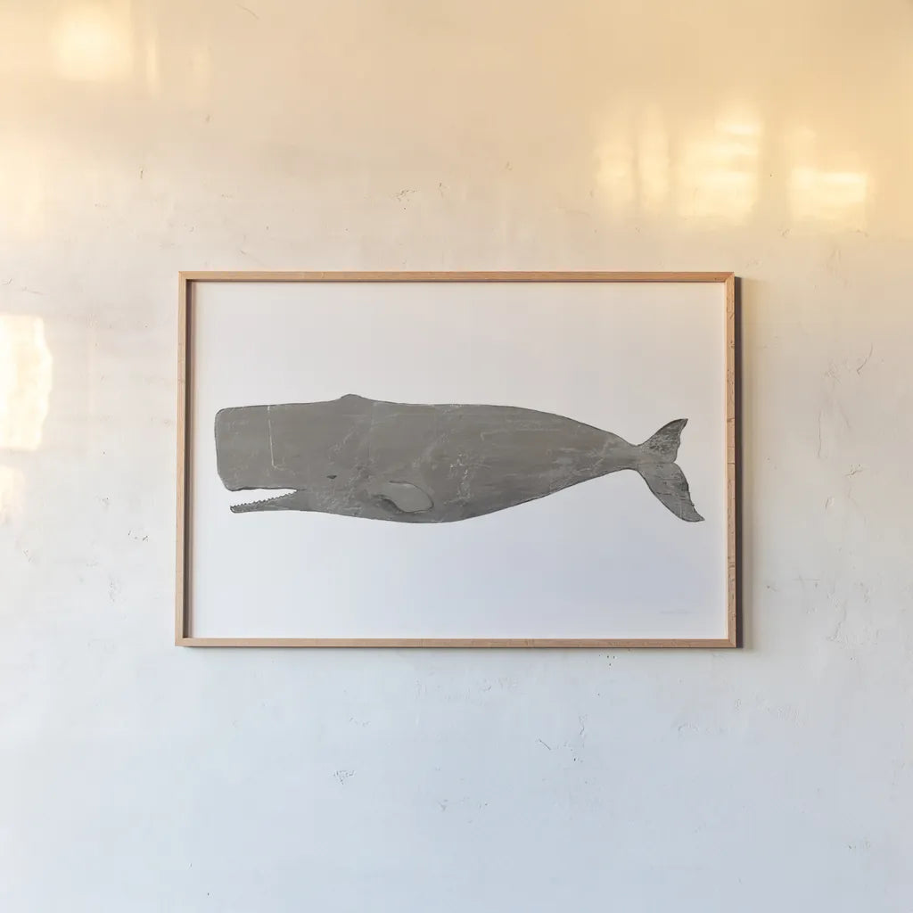 Whale on White by Avery Tillmon. shown as a paper print in a natural frame. Available as a archival giclee rolled canvas, fine art paper, or poster print. SKU 65529i.