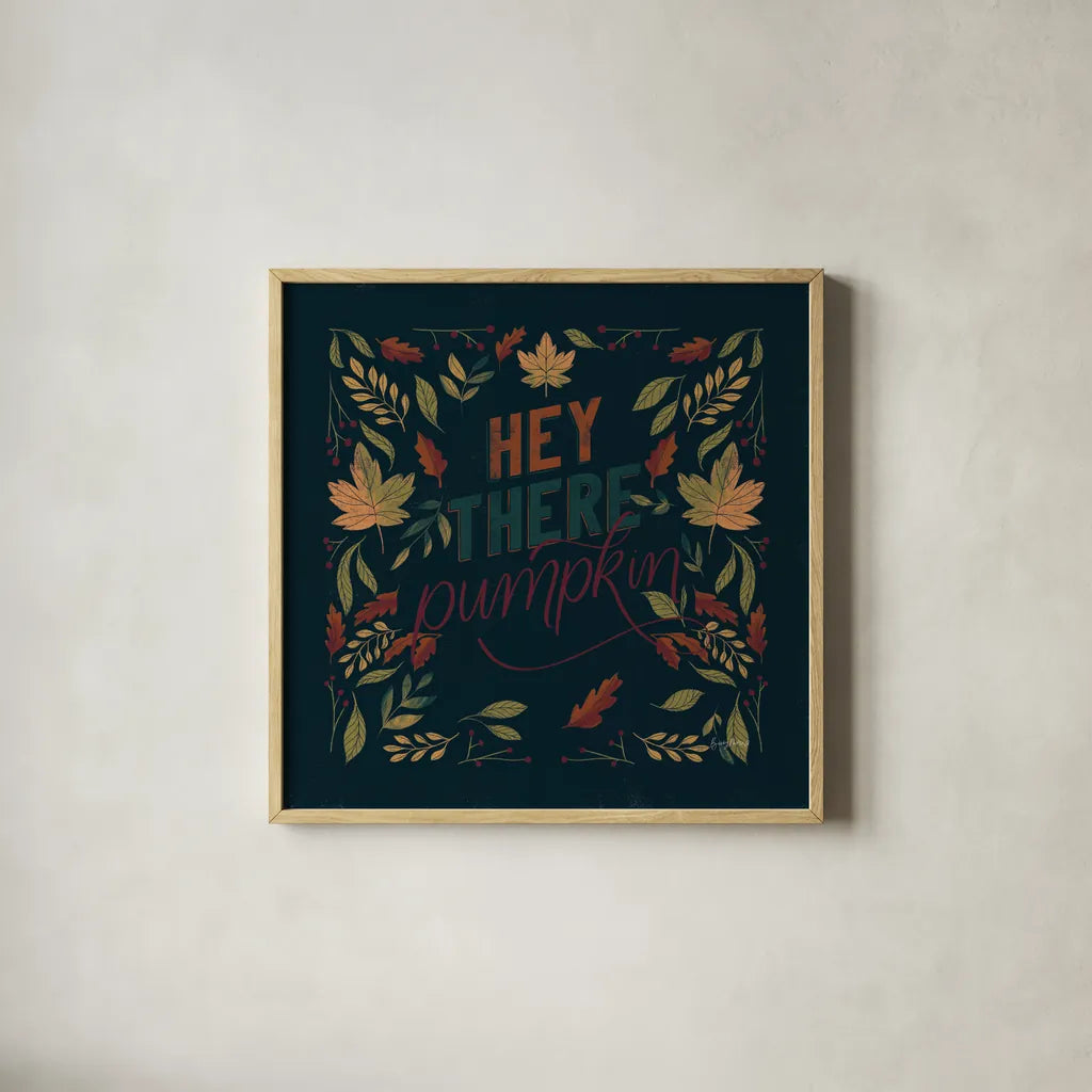 Autumn Sayings I Pumpkin by Becky Thorns. Shown in a natural wood glass frame for a timeless modern aesthetic. Available as an archival giclee rolled canvas, fine art paper, or poster print. SKU 58299a.